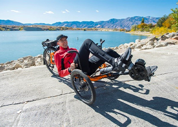 Bob Wassom on his bike chair