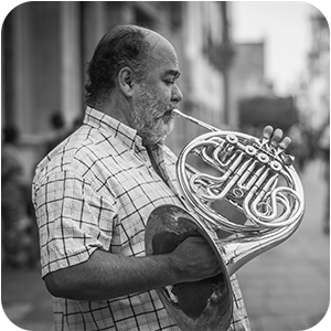 man playing horn